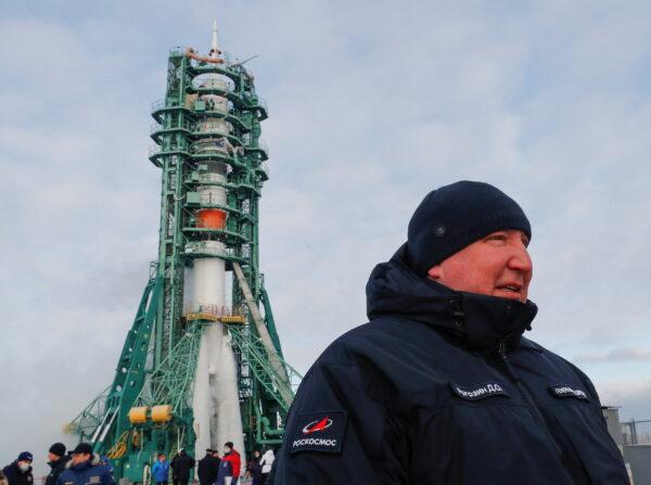 Director General of Roscosmos Dmitry Rogozin stands in front of the Soyuz MS-20 spacecraft at the Baikonur Cosmodrome, Kazakhstan, on Dec. 8, 2021. (Shamil Zhumatov/Pool/Reuters)