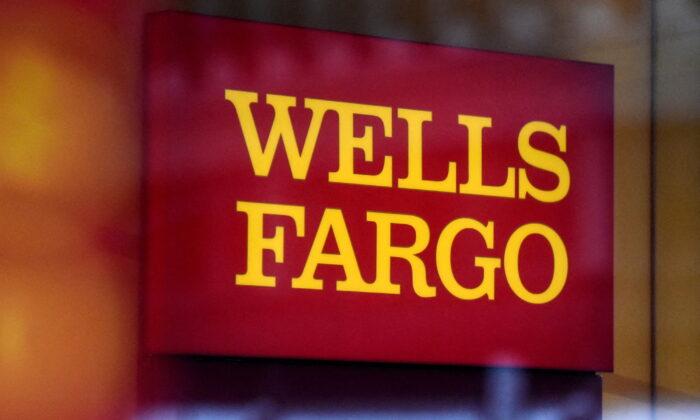 Wells Fargo Profit Falls on Sales Scandal Costs, Higher Reserves