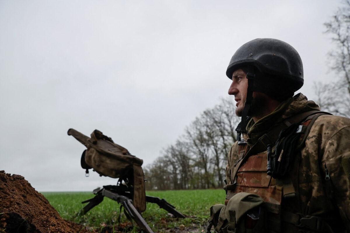 A Ukrainian serviceman stands at a position near Kharkiv, Ukraine, on April 20, 2022. (Serhii Nuzhnenko/Reuters)