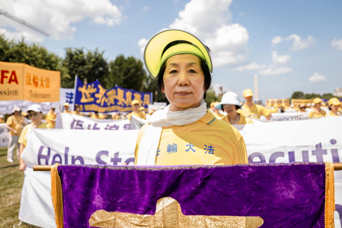 Wang Chunyan gathers with Falun Gong practitioners in Washington to mark 22 years of the persecution in China, on July 16, 2021. (Samira Bouaou/The Epoch Times)