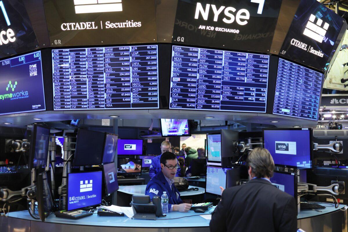 Traders work on the floor of the New York Stock Exchange on March 30, 2022. (Michael M. Santiago/Getty Images)