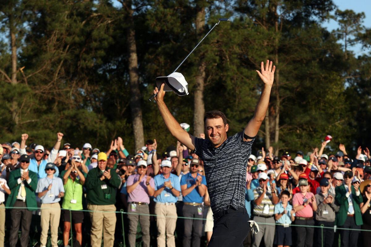 Scottie Scheffler celebrates on the 18th green after winning the Masters at Augusta National Golf Club,in Augusta, Georgia, on April 10, 2022. (Jamie Squire/Getty Images)
