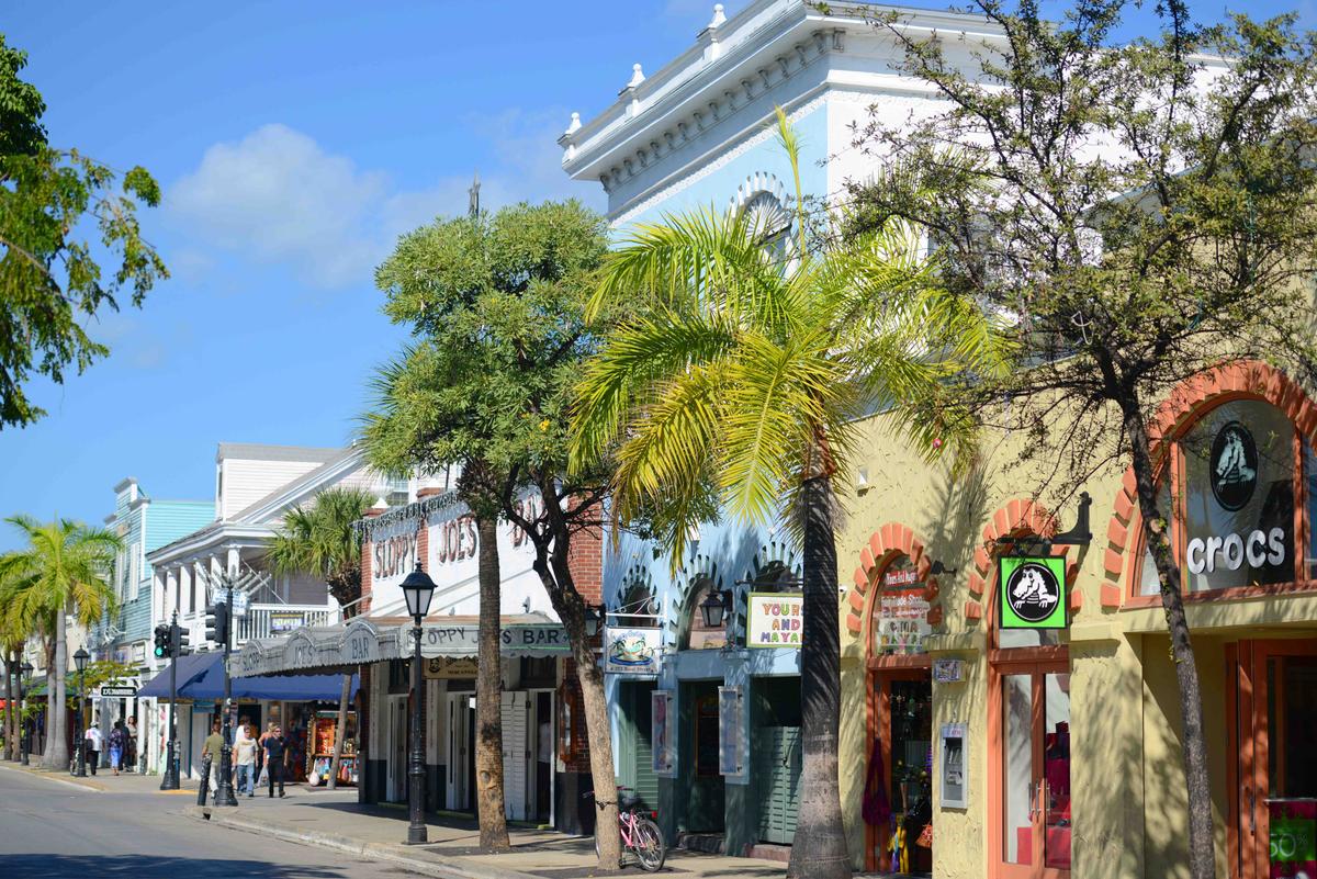 Duval Street is central to Key West's tourism and is renowned for its eclectic mix of shops, restaurants, bars, and entertainment venues. (Wangkun Jia/Shutterstock)