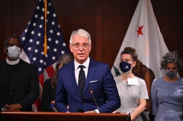 Los Angeles County District Attorney George Gascon is joined by a group of progressive district attorneys from around the country at the press conference to mark his first year in office, in Los Angeles, on Dec. 8, 2021. (Robyn Beck/AFP via Getty Images)