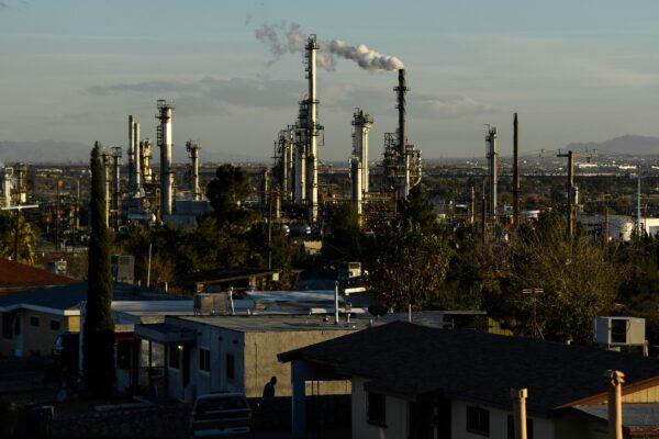 El Paso oil refinery operates near a neighborhood of homes in East-Central El Paso, Texas, on Dec. 10, 2021. (Patrick T. Fallon/AFP via Getty Images)