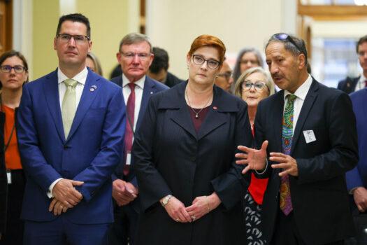 Director Maori Policy Unit of New Zealand Ministry of Foreign Affairs and Trade, Martin Wikaira (R), accompanies Minister for International Development and the Pacific Zed Seselja and Australian Foreign Minister Marise Payne during a Mihi Whakatau at New Zealand's Parliament in Wellington on April 22, 2021. (Hagen Hopkins/Getty Images)