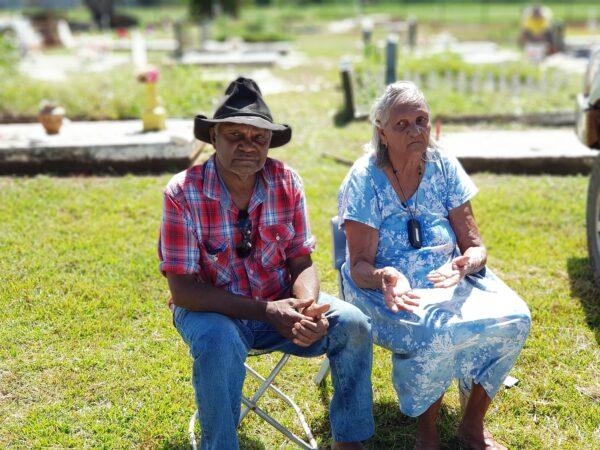 Hope Vale elder Alice Walker (R) and her nephew are interviewed for the documentary "Wawu: Divine Hope" at Hope Vale cemetery. (Courtesy of Caden Pearson)