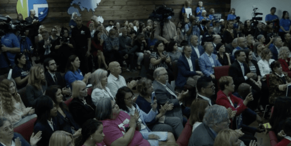 A crowd watches Florida Gov. Ron DeSantis sign HB 5 to increase protections for unborn children into law on April 14, 2022. (Screenshot, Gov. Ron DeSantis Facebook page)