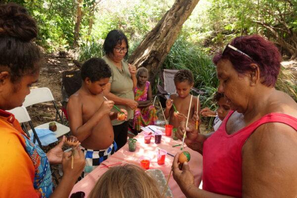 Dora Gibson (L) and Estelle Bowen (R) paint eggs with their grandkids. (Courtesy of Caden Pearson)