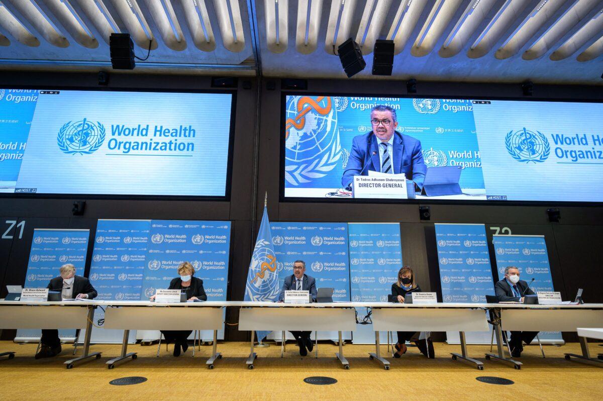 World Health Organization (WHO) Director-General Tedros Adhanom Ghebreyesus (C) speaks during a press conference at the WHO headquarters in Geneva on Dec. 20, 2021. (Fabrice Coffrini/AFP via Getty Images)