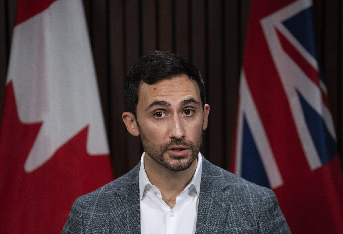 Stephen Lecce, Minister of Education for Ontario makes an announcement on preparations underway for the return to in-person learning during the COVID-19 pandemic in Toronto on Jan. 12, 2022. (The Canadian Press/Nathan Denette)
