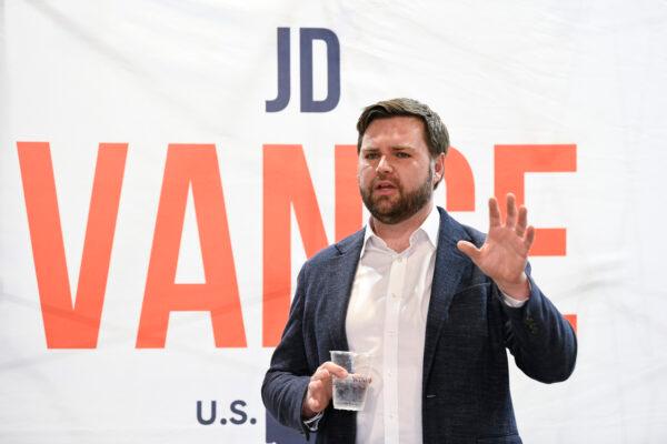 U.S. Senate candidate JD Vance speaks with prospective voters on the campaign trail in Troy, Ohio, on April 11, 2022. (Gaelen Morse/Getty Images)