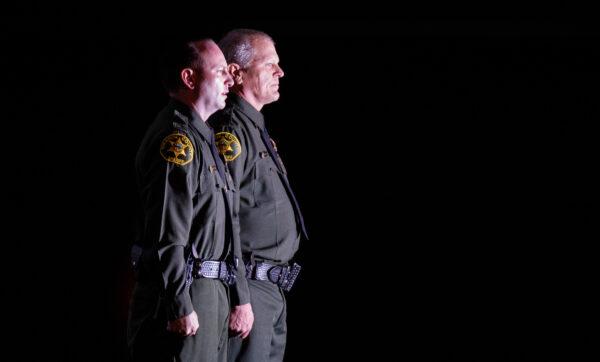 Deputies John Anderson (R) and Kevin Shively receive medals for courage at the Orange County Sheriff's Department awards ceremony celebration in Anaheim, Calif., on April 14, 2022. (John Fredricks/The Epoch Times)