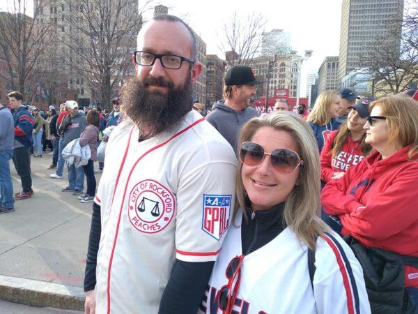 Greg Jones and his girlfriend, Danielle, are ready for the 2022 Cleveland Guardians baseball season. Jones is wearing his Rockford Peaches throwback jersey, similar to the one actor Tom Hanks wore in the 1988 hit movie, "A League of Their Own." Hanks, who threw out the first pitch at the Guardians' home opener, played Coach Jimmy Dugan of the All-American Girls Professional Baseball League in the film and was known for the line, "There's no crying in baseball!" (Michael Sakal/The Epoch Times)