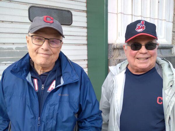 Jim Price (R) and his friend, Chuck, have been attending Cleveland baseball games for several years. They are getting ready to attend the Cleveland Guardians inaugural home opening game on April 15, 2022. (Michael Sakal/The Epoch Times)