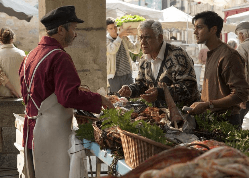 Papa (Om Puri, center) and his son Hassan (Manish Dayal, R) can't find the ingredients they need, in "The Hundred Foot Journey." (DreamWorks Pictures)