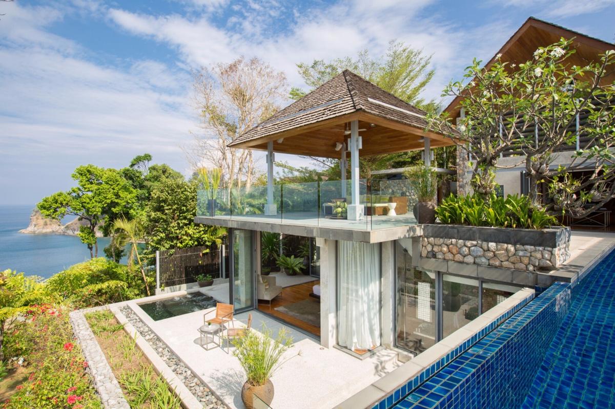 Located on a promontory covered in lush tropical vegetation, Villa Hale Malia is unique for its architecture and its stunning position overlooking the Andaman Sea. (Courtesy of villa owners and Rosemont's)