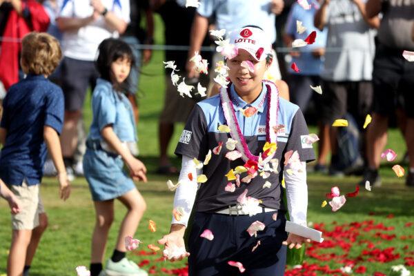 Hyo Joo Kim of The Republic of Korea has flowers thrown over her prior to the awards ceremony after winning the LOTTE Championship at Hoakalei Country Club, in Ewa Beach, Hawaii, on April 16, 2022. (Sean M. Haffey/Getty Images)