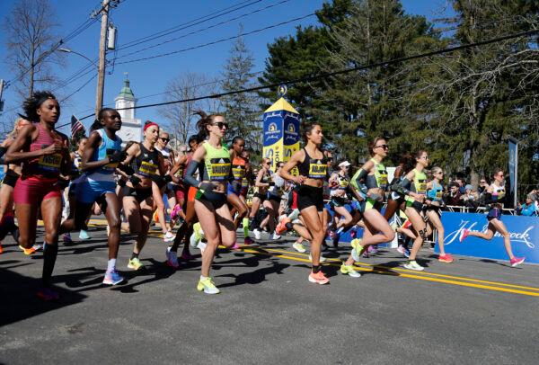 The elite women break from the starting line of the 126th Boston Marathon in Hopkinton, Mass., on April 18, 2022. (Mary Schwalm/AP Photo)