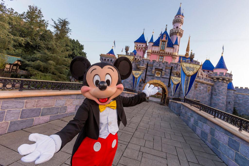 Mickey Mouse poses in front of Sleeping Beauty Castle at Disneyland Park in Anaheim, Calif., on Aug. 27, 2019. (Joshua Sudock/Walt Disney World Resorts via Getty Images)