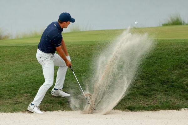 Jordan Spieth plays his shot from the bunker on the 18th hole in a playoff during the final round of the RBC Heritage at Harbor Town Golf Links, in Hilton Head Island, South Carolina, on April 17, 2022. (Kevin C. Cox/Getty Images)
