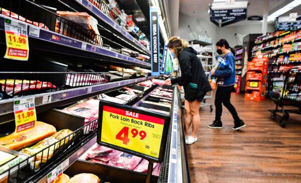 People shop at a grocery store in Monterey Park, Calif., on April 12, 2022. (Frederic J. Brown/AFP via Getty Images)