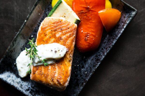 You can increase your DHA and EPA intake by eating fatty fish (By Photo by Malidate Van/Pexels)