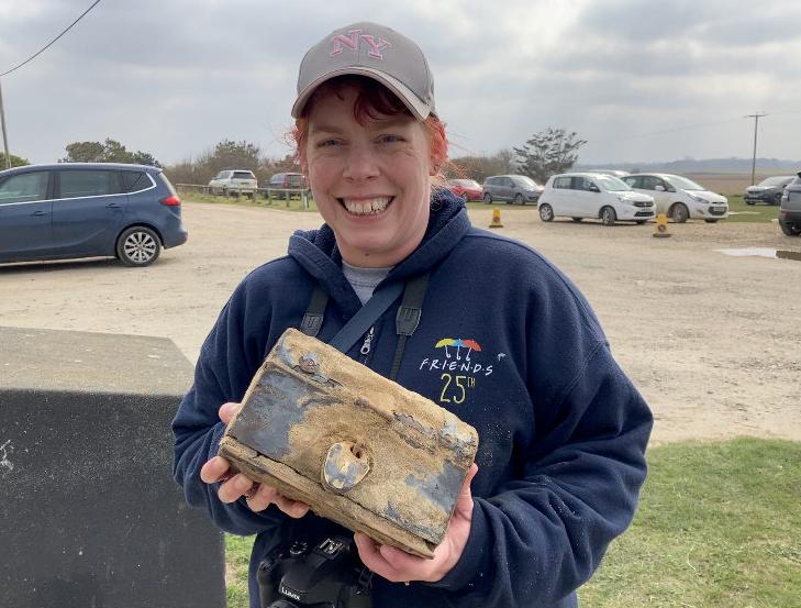 Jennie Fitzgerald with her treasure that was found at a beach cleanup. (SWNS)