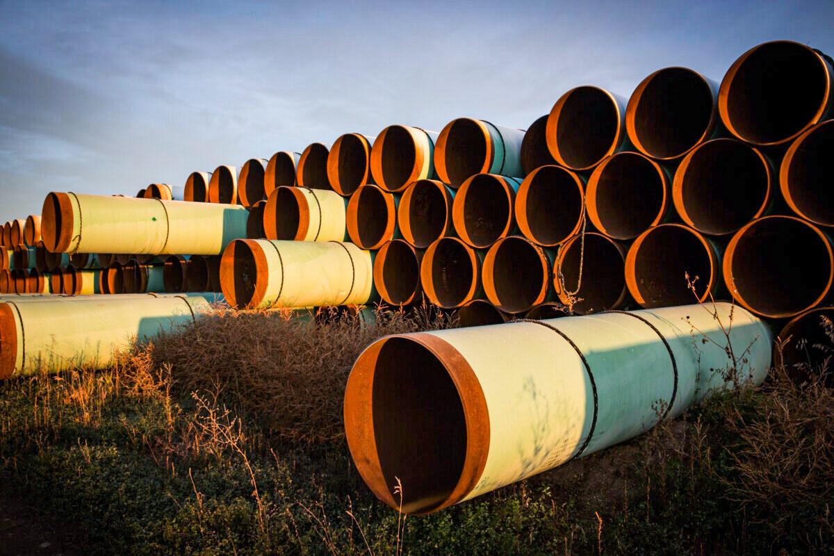 Miles of unused pipe, prepared for the proposed Keystone XL pipeline, in a lot outside Gascoyne, N.D., on Oct. 14, 2014. (Andrew Burton/Getty Images)