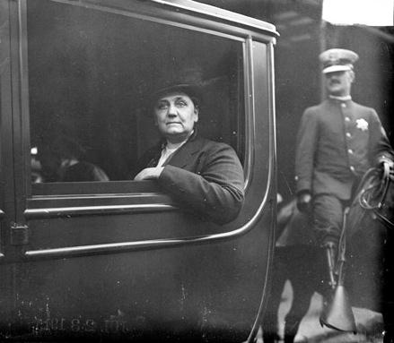 Photograph of Jane Addams in a car, 1915. Chicago Daily News. (Public Domain)