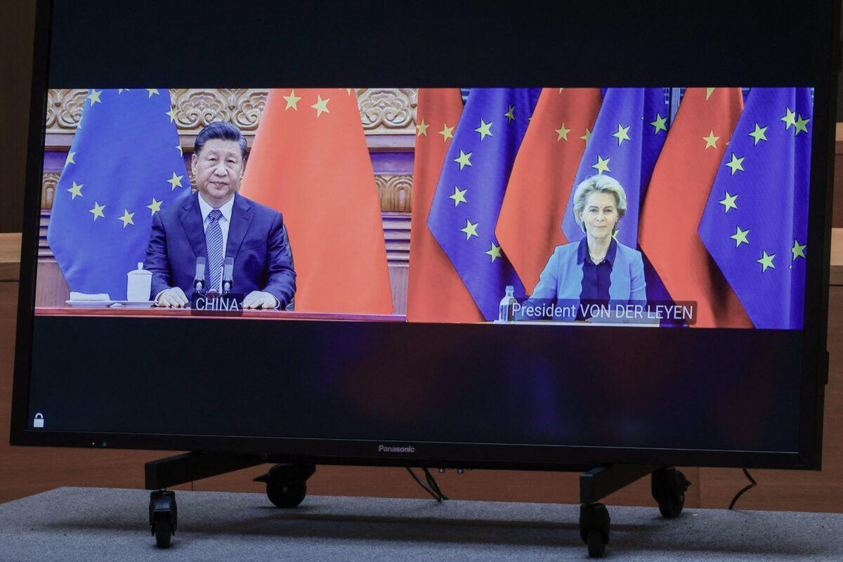 Chinese leader Xi Jinping and European Commission President Ursula von der Leyen speak via video conference with European Council President and European Union foreign policy chief during an EU-China summit at the European Council building in Brussels on April 1, 2022. (Olivier Matthys/Pool/AFP via Getty Images)