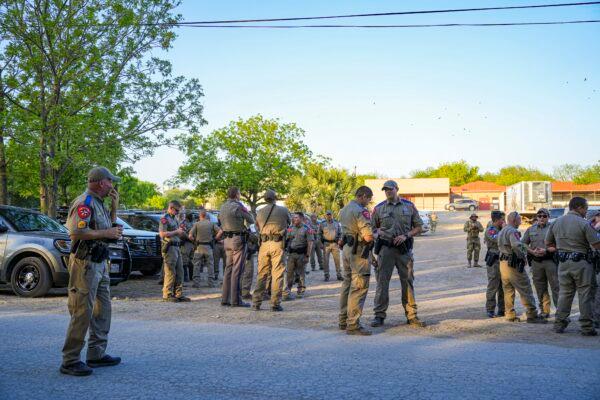 Texas Department of Public Safety state troopers meet up at shift-change in Brackettville, Texas, on April 18, 2022. (Charlotte Cuthbertson/The Epoch Times)