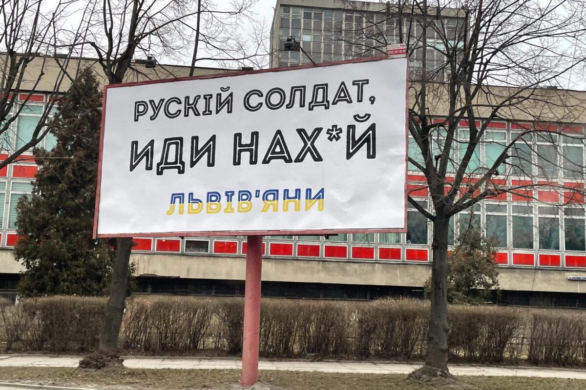 A billboard reads “Russian soldier, go [expletive] yourself,” in western Ukraine, on March 20, 2022. (Charlotte Cuthbertson/The Epoch Times)