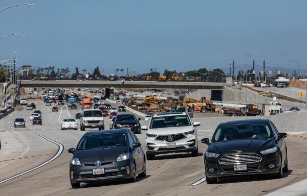 Cars merge onto the State Route 73 southern interchange from the Interstate 405 in Costa Mesa, Calif., on April 21, 2022. (John Fredricks/The Epoch Times)(John Fredricks/The Epoch Times)