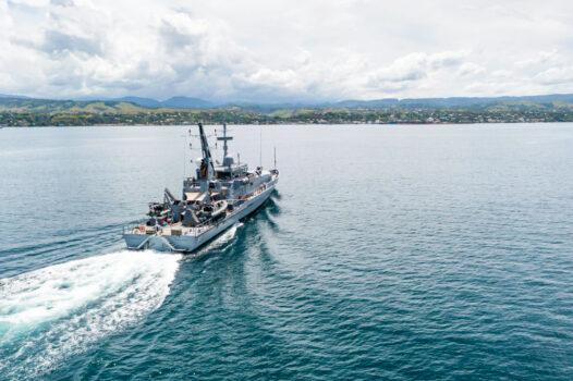  In this handout provided by the Australian Department of Defence, Armadale Class Patrol Boat, HMAS Armidale, sails into the Port of Honiara, Guadalcanal Island, Solomon Islands, on Dec. 1, 2021. (CPL Brodie Cross/Australian Department of Defence via Getty Images)