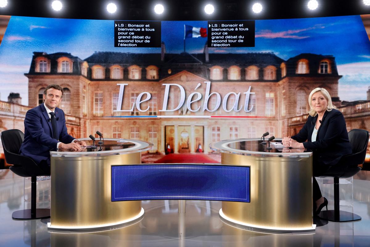 Macron, Le Pen Clash on Russia, EU in TV Debate