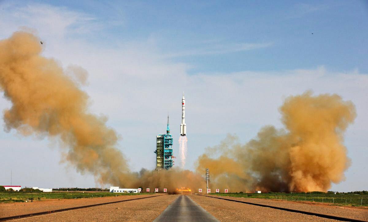 The Long March-2F rocket carrying China's manned Shenzhou-10 spacecraft blasts off from its launch pad at Jiuquan Satellite Launch Center in Jiuquan, Gansu Province of China, on June 11, 2013. Manned space flights have been the public face of China's push into space, which has also included secret efforts to build anti-satellite weapons. (ChinaFotoPress/Getty Images)