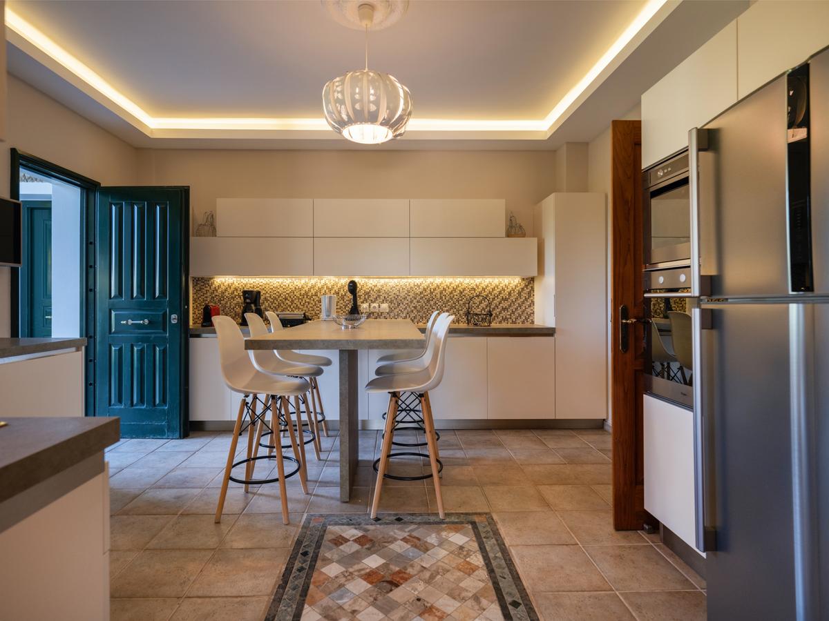 Each of the three houses of the estate has its own gourmet kitchen. Once again, the focus is on uncluttered, unpretentious living in style. (Courtesy of Greece Sotheby's International Realty)