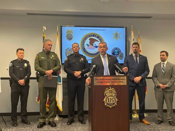 Seven suspected drug dealers are facing federal charges for allegedly selling fentanyl-laced narcotics that caused fatal overdoses, announced at a news conference in Santa Ana, Calif., on April 22, 2022. (Carol Cassis/The Epoch Times)