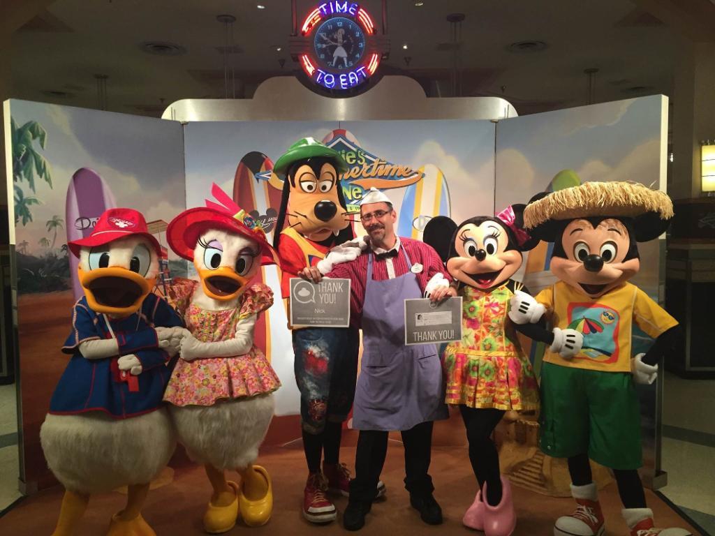 Disney employee Nick Caturano poses with fellow cast members at Walt Disney World in Orlando in an undated photo. (Courtesy of Nick Caturano)