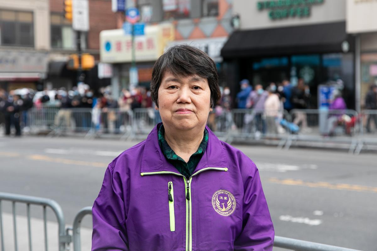 Falun Gong practitioner Li Huilai participates in a parade to commemorate the 23rd anniversary of the April 25th peaceful appeal in Beijing, in Flushing, N.Y., on April 23, 2022. (Chung I Ho/The Epoch Times)