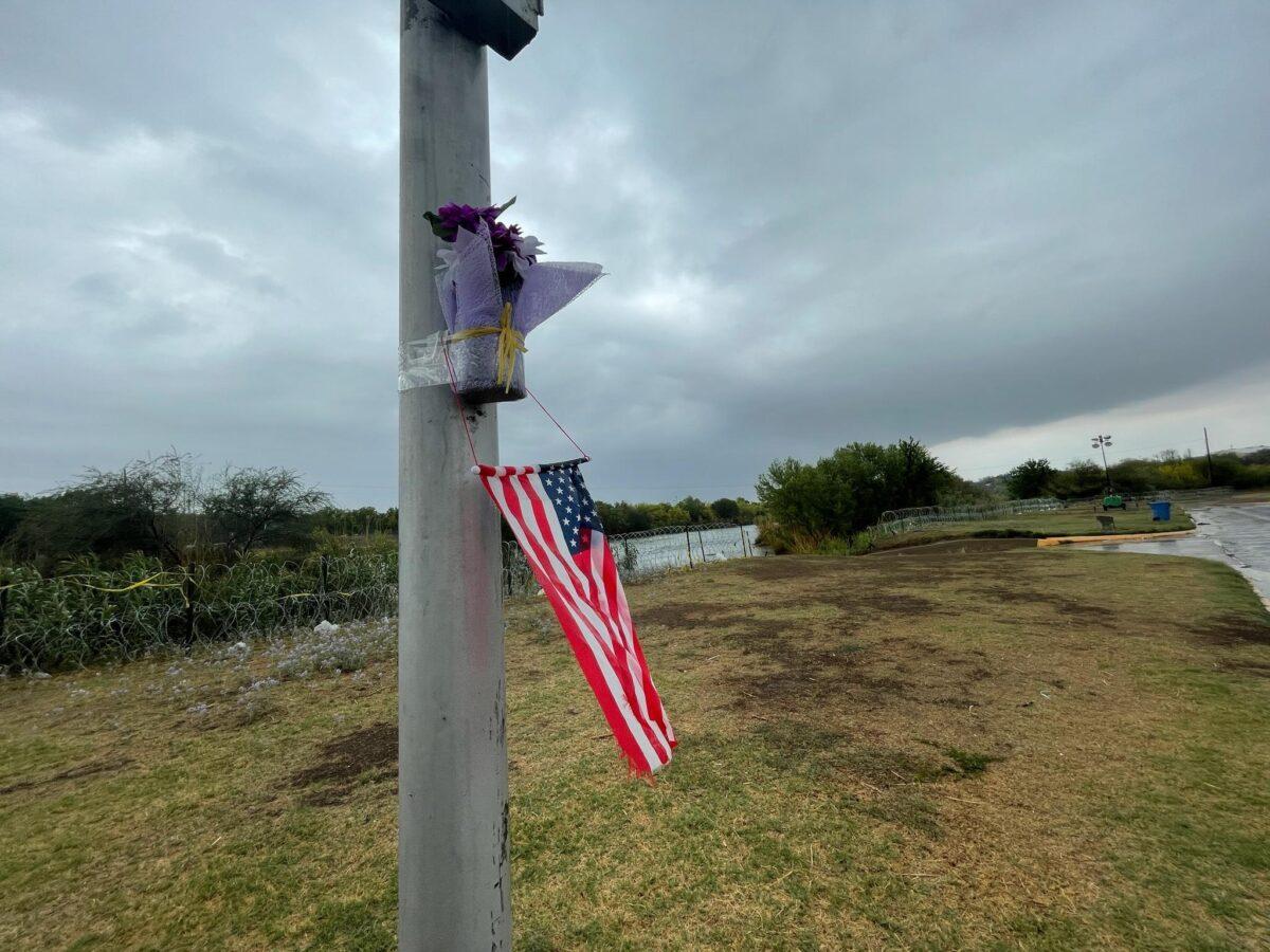 An American flag flies near where National Guard soldier Bishop E. Evans went missing, in Eagle Pass, Texas, on April 25, 2022. (Charlotte Cuthbertson/The Epoch Times)