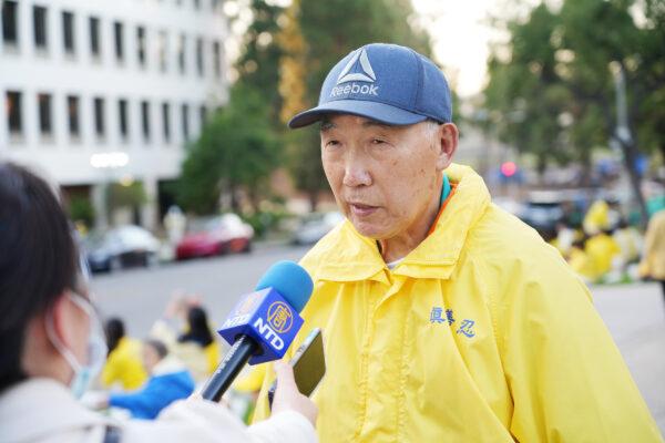 Fangheng Ou, a former Shenyang senior engineer who participated in the April 25 petition in 1999, attends a rally in front of the Chinese Consulate in Los Angeles on April 23, 2022. (Debora Cheng/The Epoch Times)