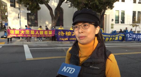 Organizer Kerry Huang speaks to NTD Television about the candlelight vigil in front of the Chinese Consulate in San Francisco on April 24, 2022. (Ted Lin/NTD Television)