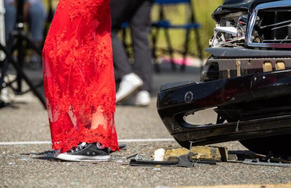 Students at Tesoro High School watch a mock DUI situation in Las Flores, Calif., on April 25, 2022. (John Fredricks/The Epoch Times)