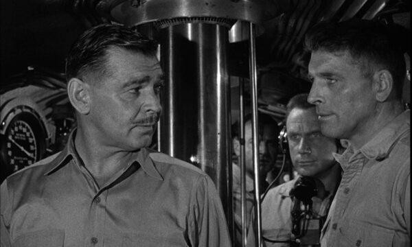 Tensions rise between Clark Gable as Cmdr. “Rich” Richardson (L) and Burt Lancaster as Lt. Jim Bledsoe (R) in “Run Silent, Run Deep.” (United Artists)