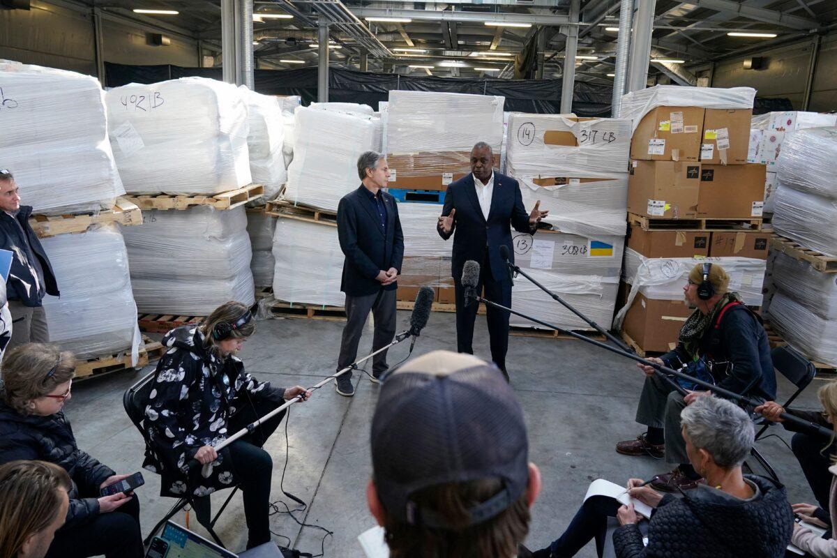 Pallets of aid to Ukraine are stacked behind U.S. Secretary of Defense Lloyd Austin (R) and U.S. Secretary of State Antony Blinken (L) as they speak with reporters after returning from their trip to Kyiv, Ukraine, and meeting with Ukrainian President Volodymyr Zelenskyy in Poland near the Ukraine border on April 25, 2022. (Alex Brandon/Pool/AFP via Getty Images)