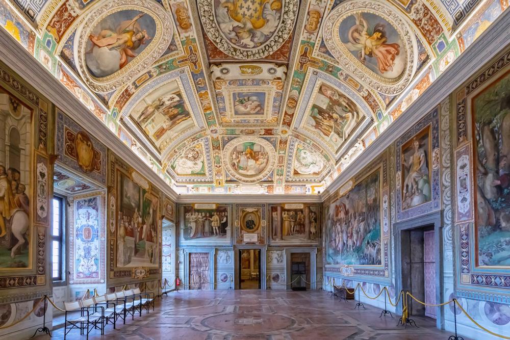 “Sala dei Fasti Farnesiani” (Room of Farnese Deeds) depicts the feats and noble deeds of the Farnese family, including scenes from the founding of the town of Orbetello and bringing peace to the city of Orvieto by driving out invading forces. The frescoes also show the Farnese family as leaders in the service of the church. (Claudio Bottoni/Shutterstock)
