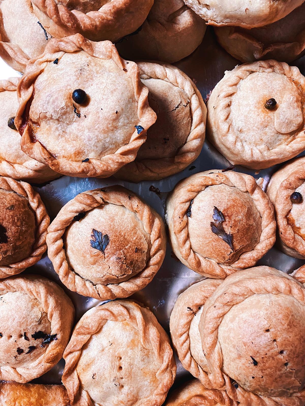 Traditionally made for Easter, "panades," small meat-filled pies, can be found year-round. (Alejandra Cifre González/Unsplash)