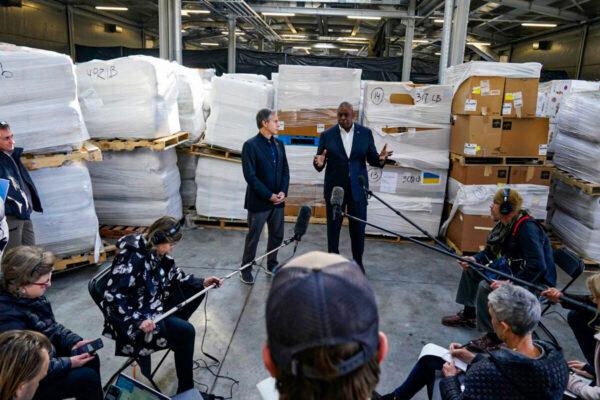 Pallets of aid to Ukraine are stacked behind Secretary of Defense Lloyd Austin (R) and Secretary of State Antony Blinken (L) as they speak with reporters after returning from their trip to Kyiv, Ukraine, and meeting with Ukrainian President Volodymyr Zelenskyy, in Poland near the Ukraine border on April 25, 2022. (Alex Brandon/Pool/AFP via Getty Images)